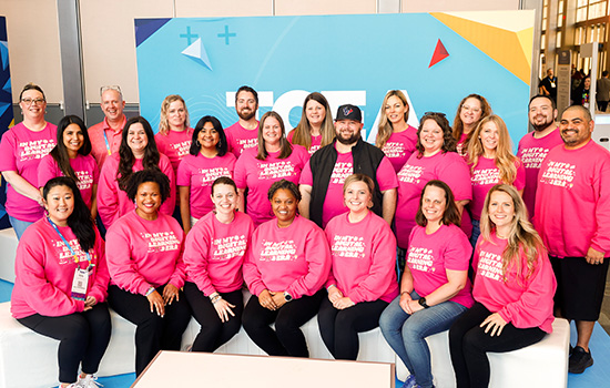 Teachers and Administrators from a school district posing for a picture at the TCEA Convention & Exposition.