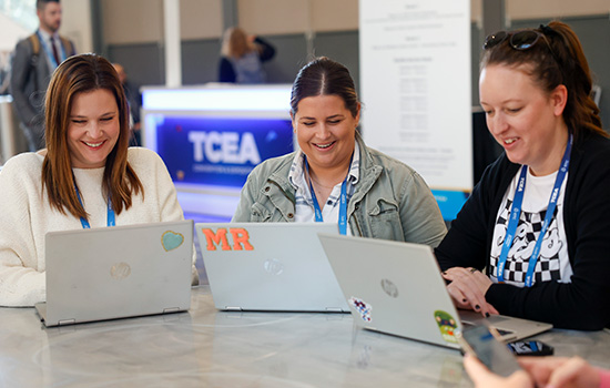 Educators sitting together building their custom schedule of sessions at the TCEA Convention & Exposition.